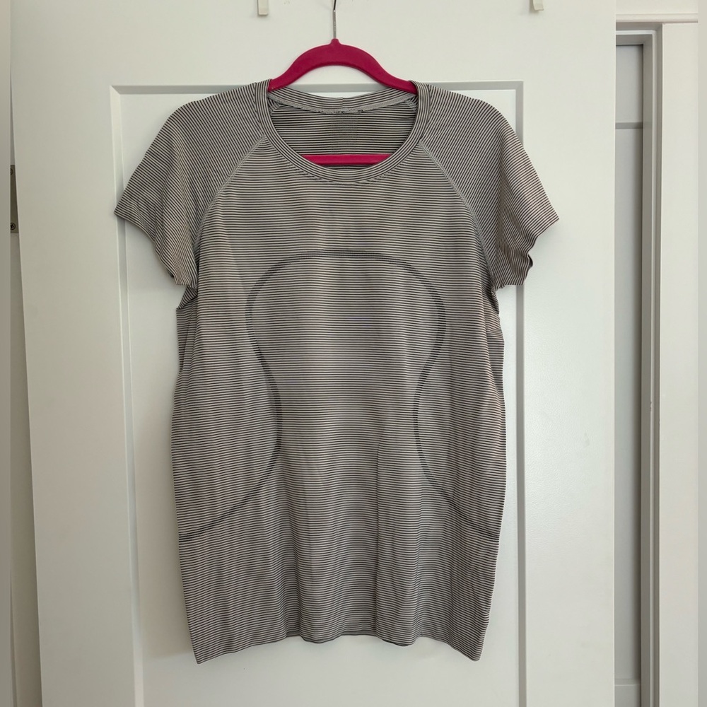 lululemon Swiftly Tech Hip Length Short Sleeve / Size 12 / Black & White Stripe